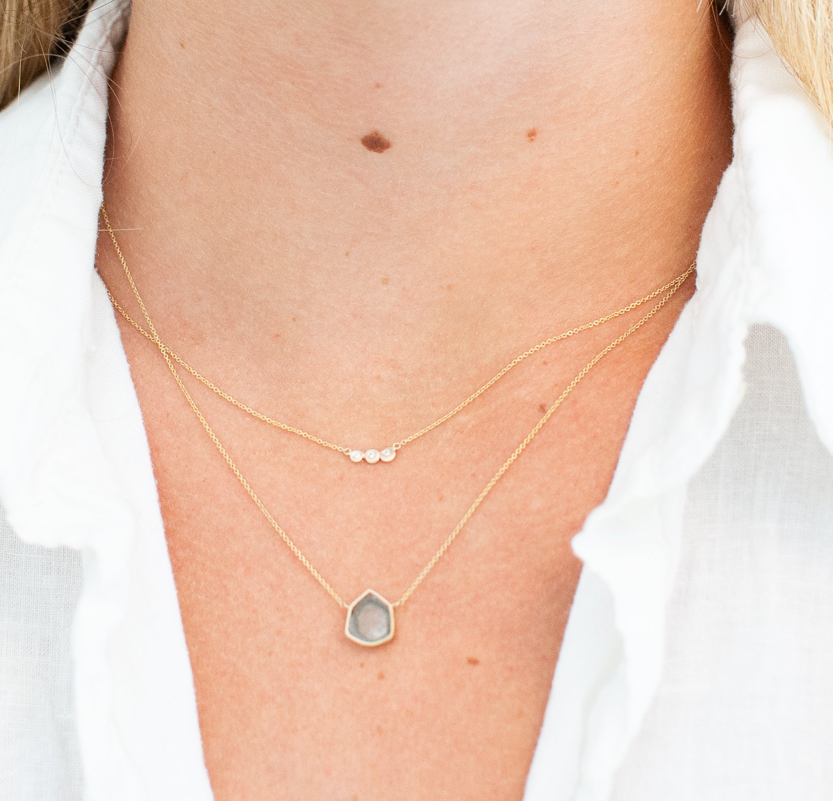 blue tourmaline necklace and river rock neclace.jpg