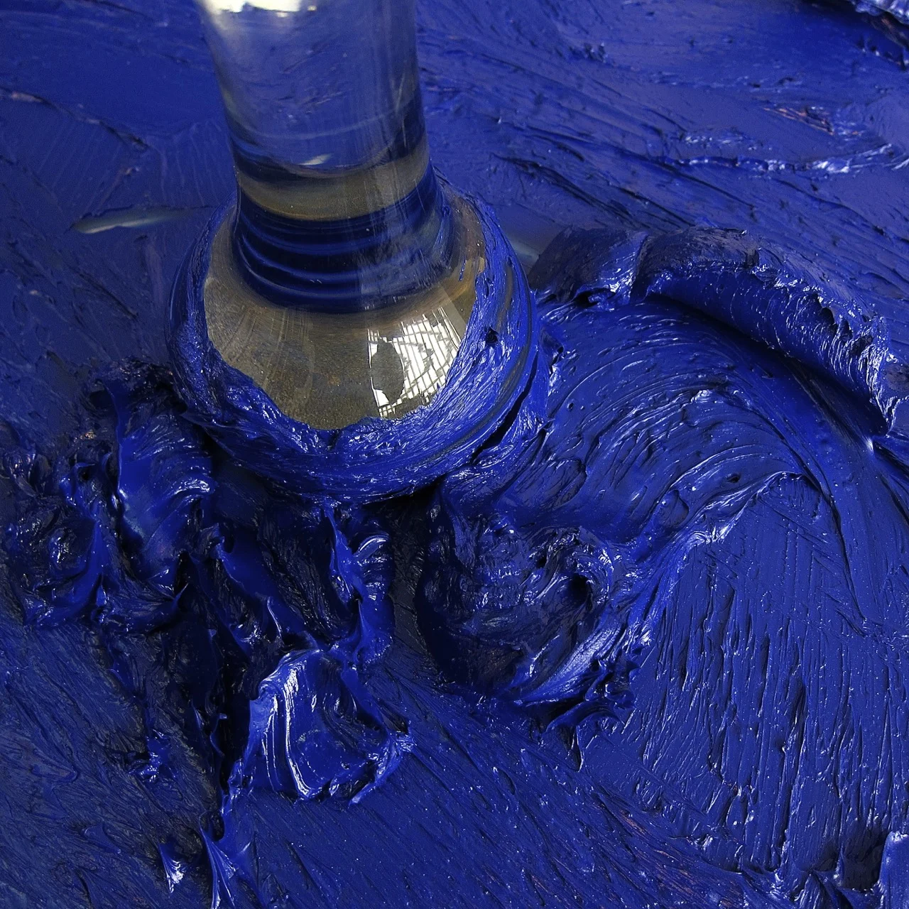 mixing blue pigment in my studio