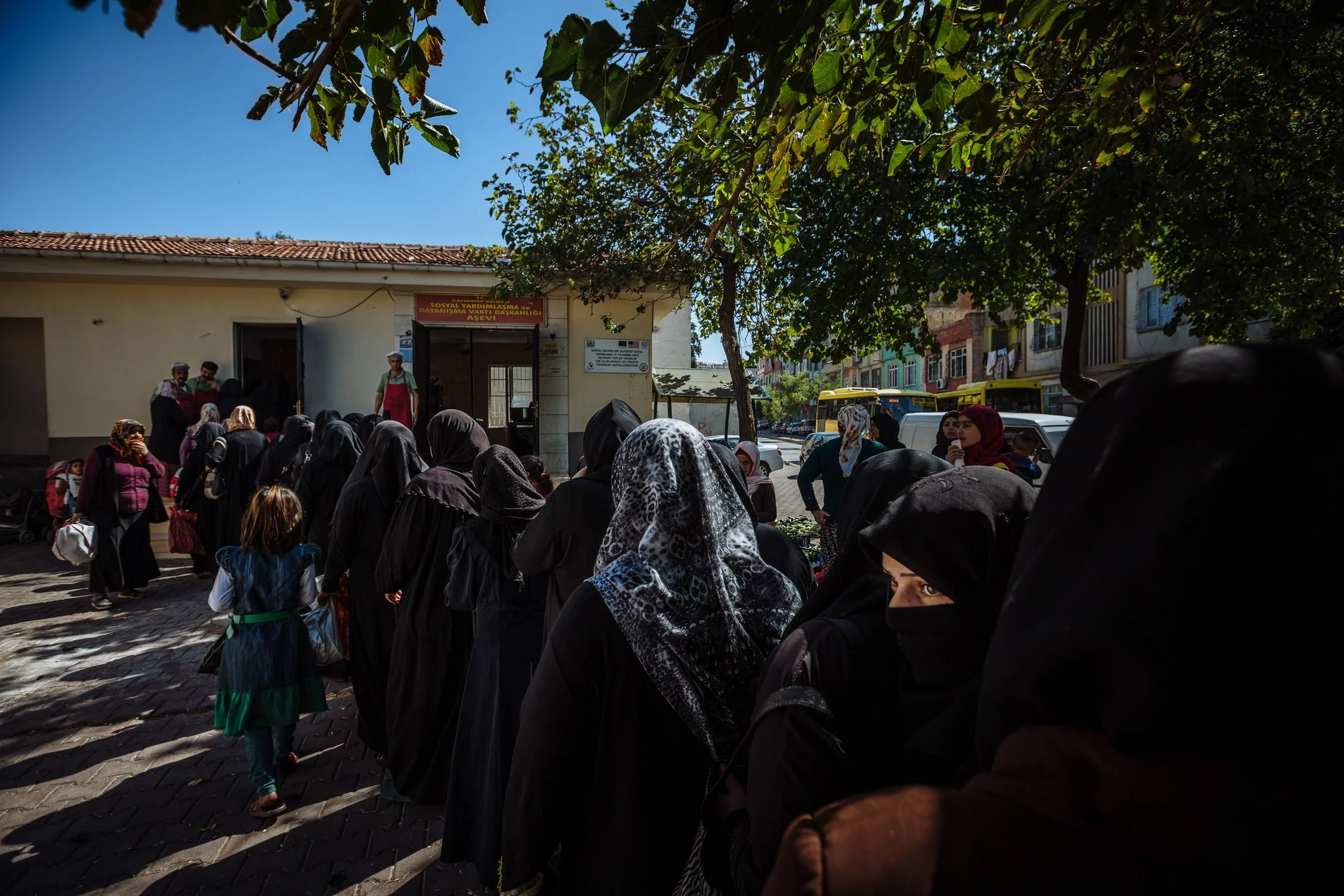 Hundreds of Syrian refugees line up at a soup kitchen in Gaziantep, Turkey. For many Syrian refugees, this is the only meal they recieve in the day. 