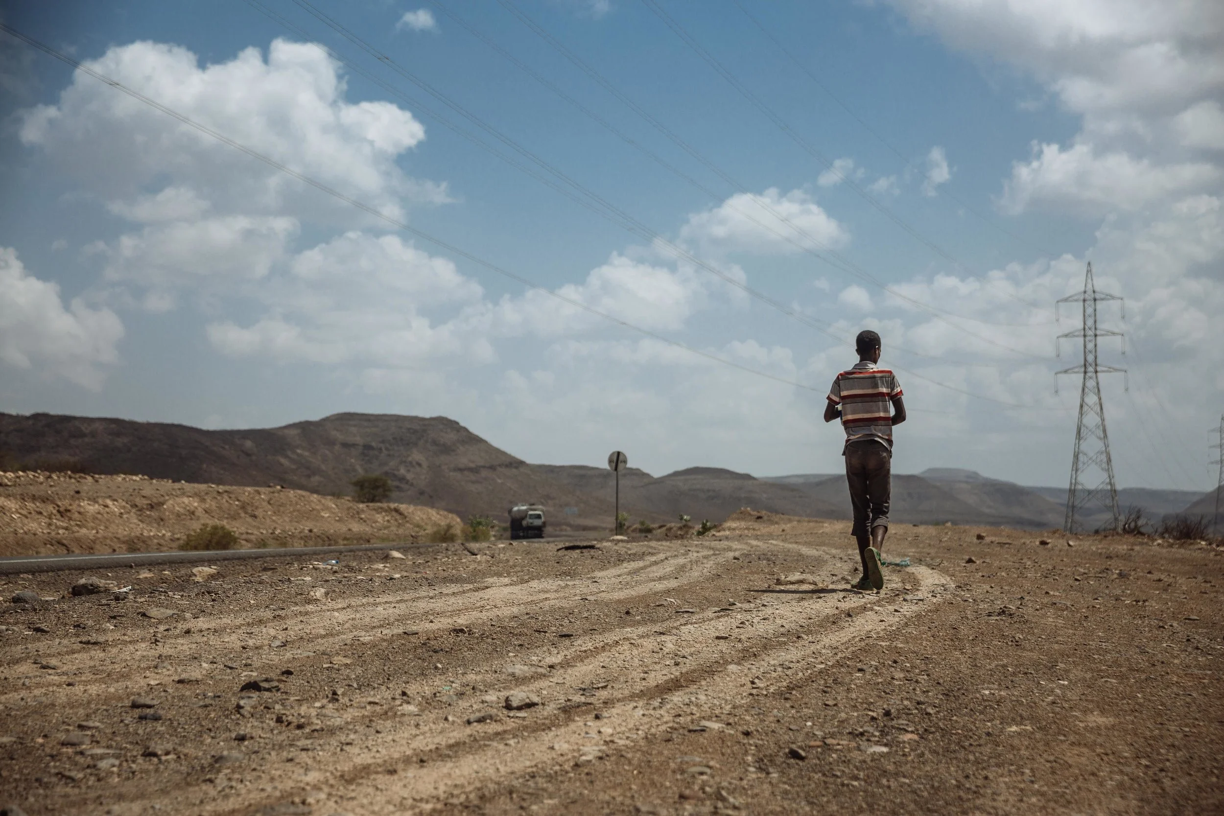 In the horn of Africa, Ethiopian migrants travel through hundreds of kilometers of desert in hopes of a better future. Many stemming from poor villages, are sold tales of better job prospects by smugglers claiming safe passage into Saudi Arabia via Djibouti and Yemen. Several make it as far as Djibouti, where they struggle to make ends meet, while others carry on to Yemen with little or no idea they are walking into certain danger.