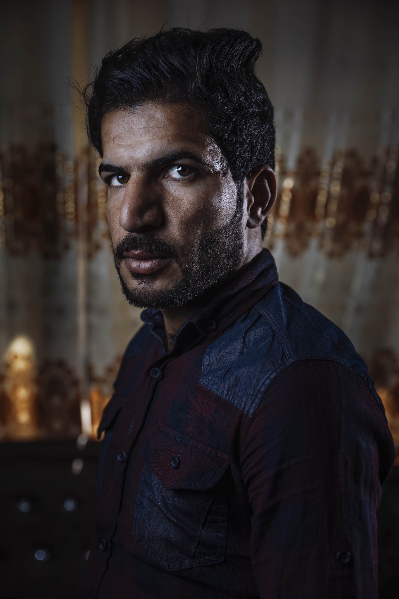 Taha lives back home in Qayara after being displaced for several months by ISIS. Unlike other who lived under ISIS occupation, Taha is one of the few people who has survived being captured four times by ISIS and narrowly escaped an execution. He still carries the scar along the left side of his skull where the bullet grazed him during a failed execution attempt where he managed to swim away in a river.