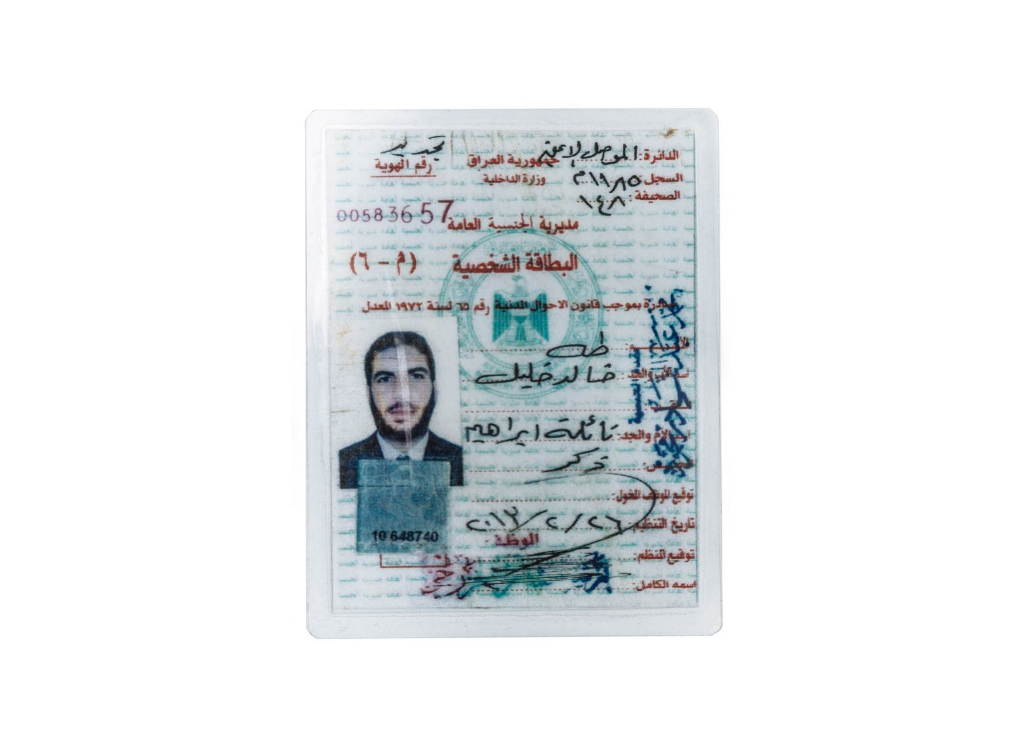 Taha’s fake ID he made while living in hiding in Mosul. “This Fake ID managed to convince ISIS I was somebody else when they were searching for me. It saved my life,” he says.