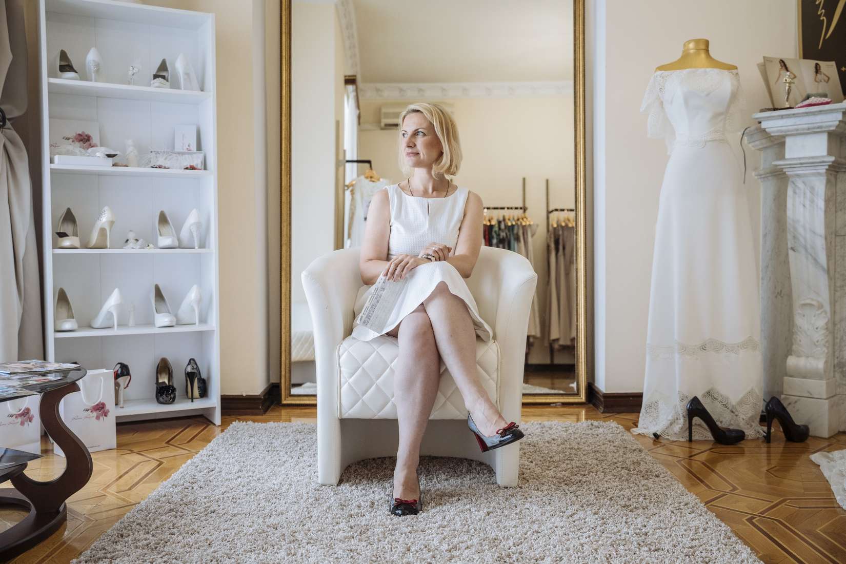 Tatiana sits in her bridal shop in Kyiv, Ukraine. Originally from Donetsk, her local business was robbed in 2014 by armed groups and following the incident, decided to flee to the capital. Over the next couple of years, Tatiana would go on to create her own business selling wedding dresses through the help of other women who have also become displaced. To this day, Tatiana still carries the train ticket she bought to leave Donetsk as a reminder of how far she’s come and to be appreciative of the good moments in life.