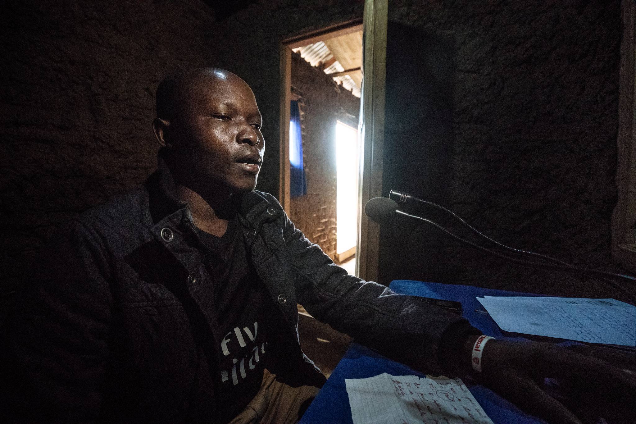 Anyozo Omani runs the radio station in Komanda which broadcasts to nearly 30,000 people in the area. 'The station is the first thing that reaches everyone. Sometimes survivors call in to our show and admit they didn't believe the disease was real un