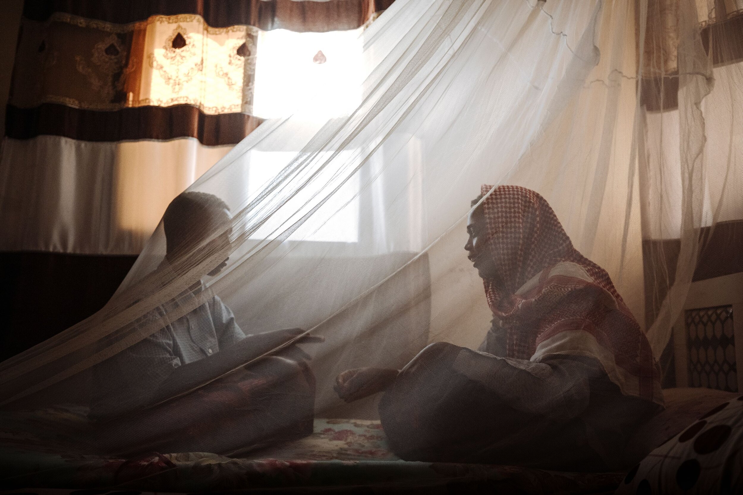 Two children play in a shelter for unaccompanied victims of trafficking in Bosasso, Puntland. Young and gullible, they fell for the trafficker’s promise to take them to Dubai to find jobs. “The man came to the school,” Ali recalled. “He told us h