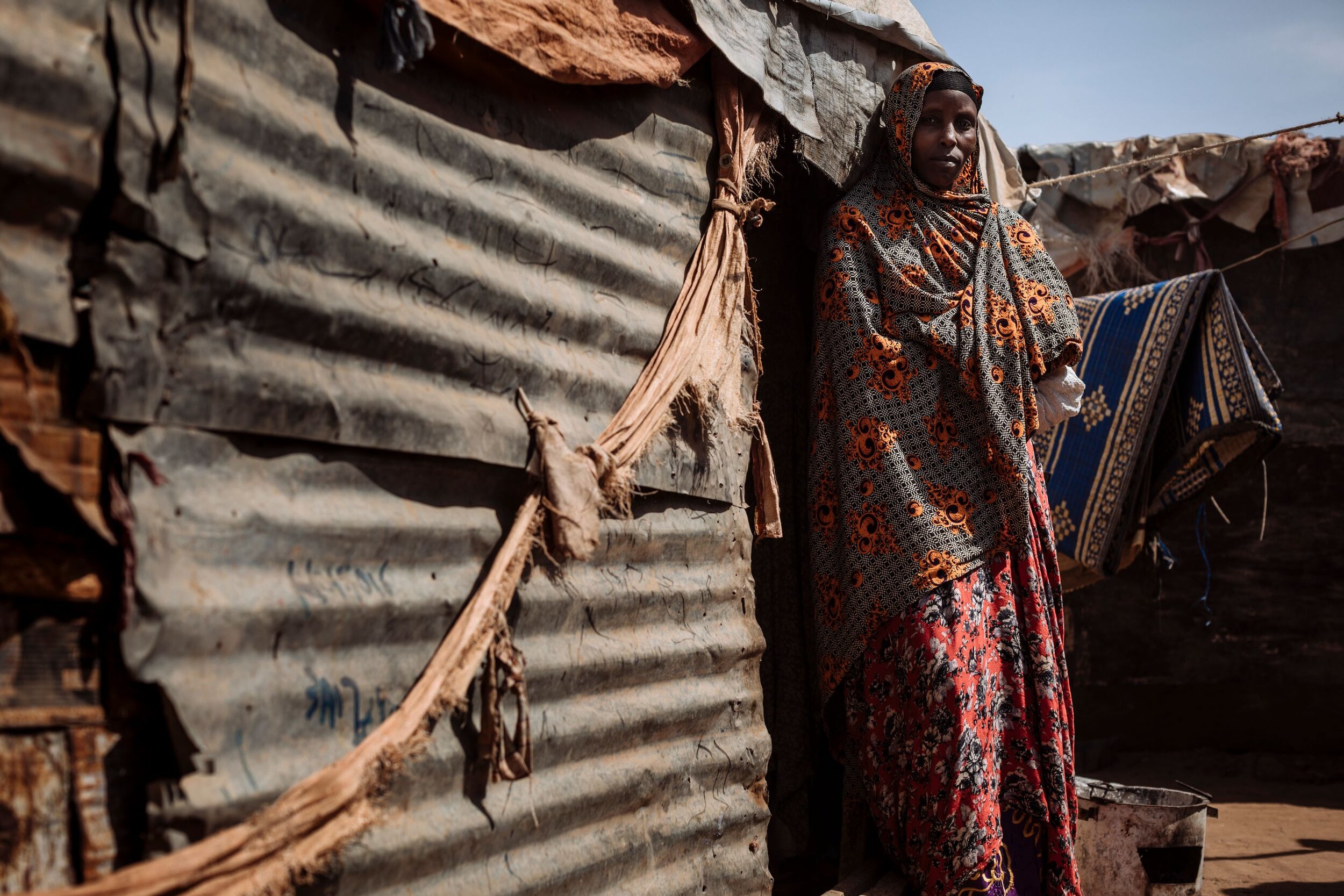 Roman fled Ethiopia when she was 18-years-old. She arrived in Somalia, hoping to build a safer life. Widowed at a young age with three mouths to feed, tired and unable to provide for them, she married another man, and had two more children. They