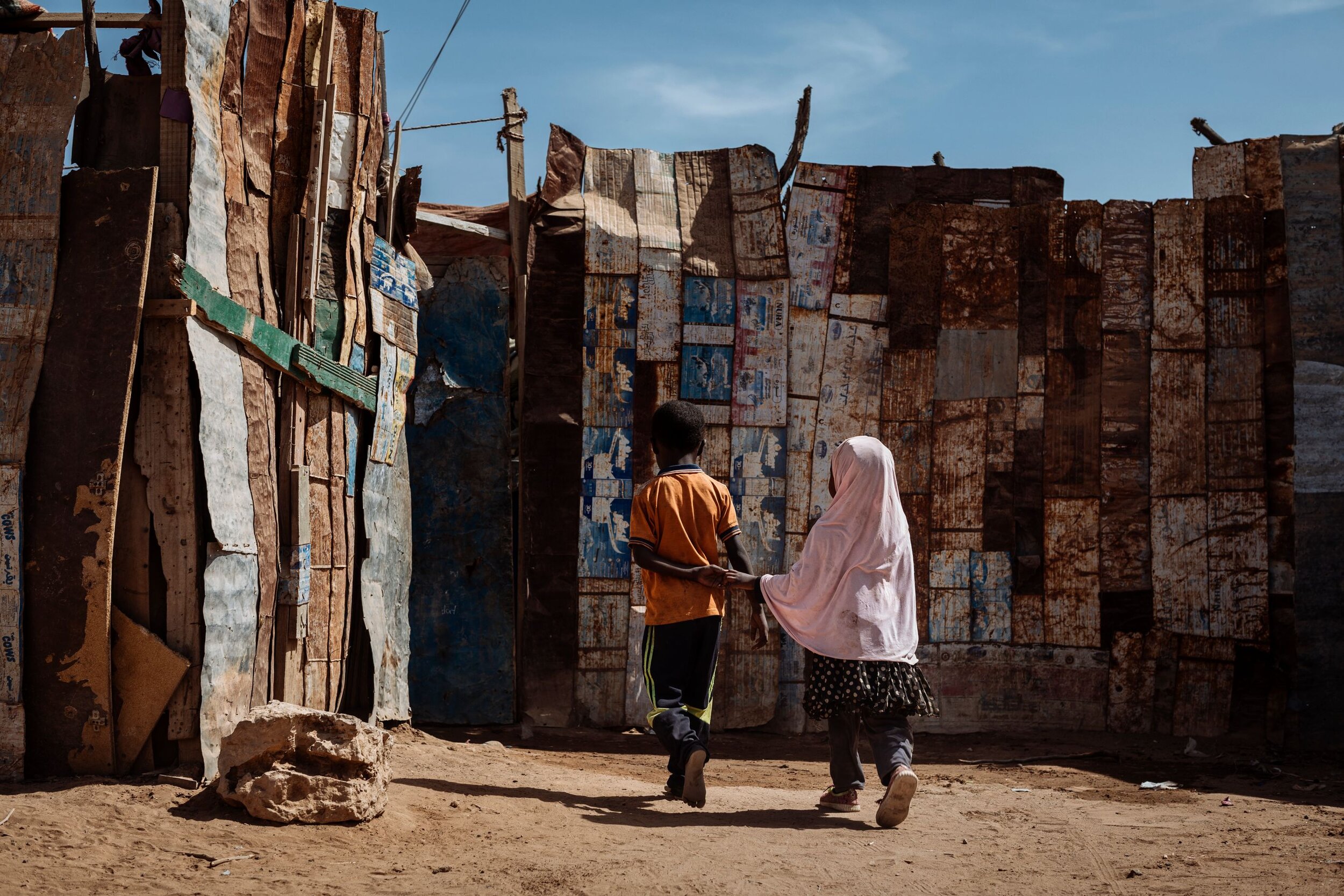 Two Ethiopian children outside their home in a shantytown in Burco, Somaliland. The informal settlement which has existed for several years, is home to dozens of Ethiopian migrants who had tried to make the journey to Saudi Arabia but failed to even