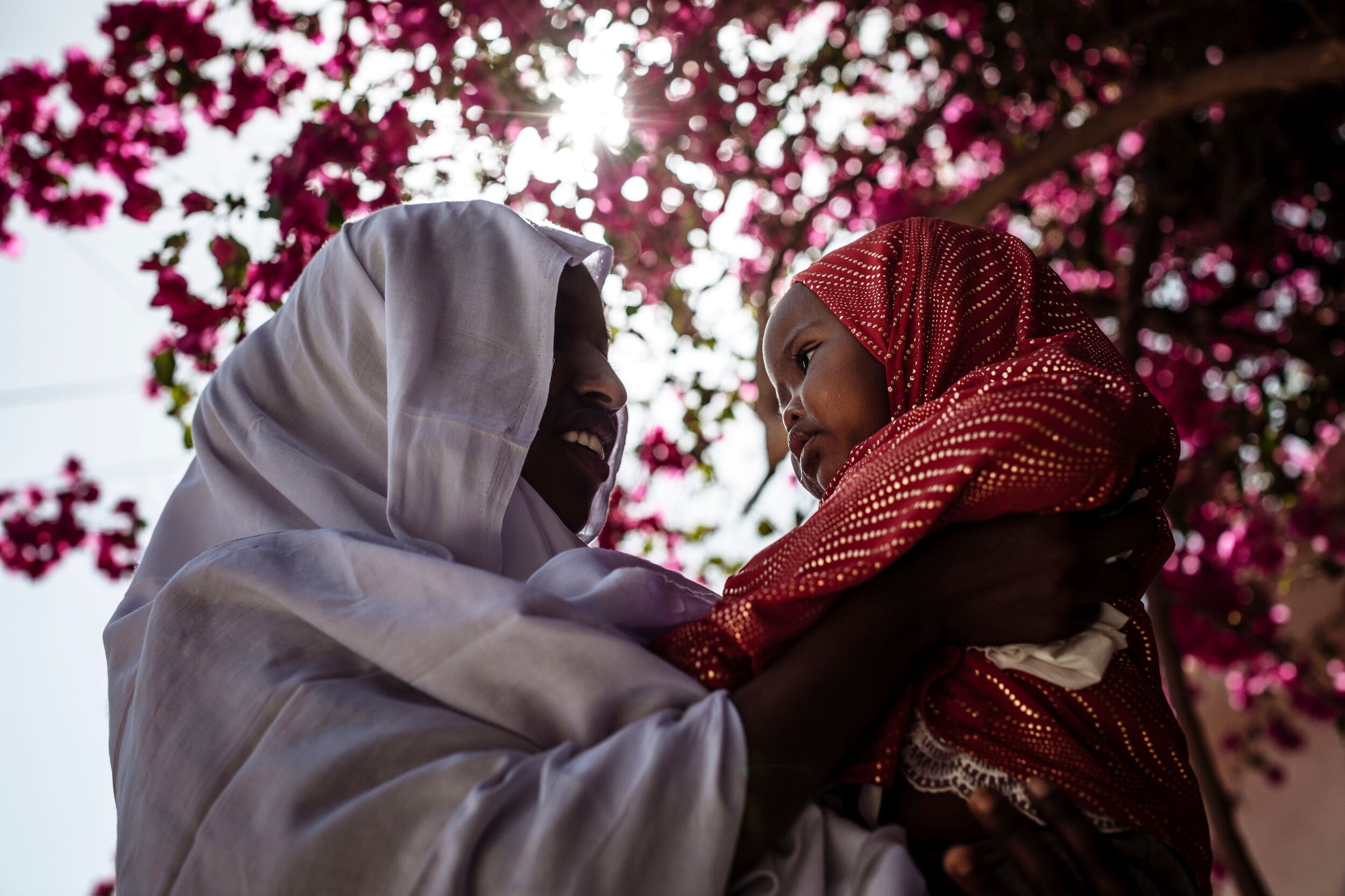 Fadmou holds her baby girl as she waits in a clinic in Hargeisa, Somaliland. The 18-year-old Ethiopian and her husband plan to migrate to Yemen and then to the Gulf in search of a better life. “Life has not treated us kindly here,” she said. “My