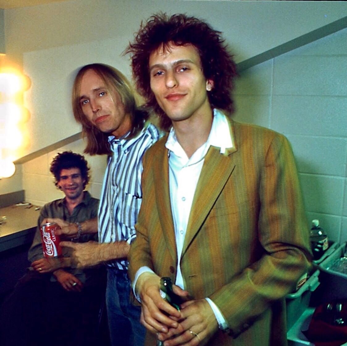 &quot;You gotta meet these guys,&quot; Mike Campbell says. &quot;They're great. They were telling me how much they like your new song 'Running Down the Drain.'&quot; Tom Petty is pleased to meet Paul Westerberg &amp; Tommy Stinson at the start of the