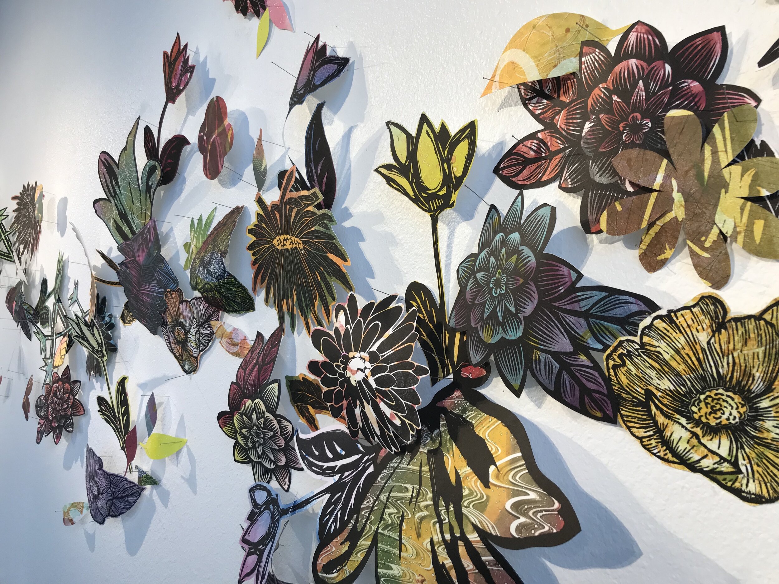 Linocut and Monoprint, Detail of 12’ x 4’ Installation, 2020 Students responded to the following prompt: The year is 2500 and the Earth as we once knew it is completely changed. Humanity’s well-being is stable, but we have survived by living in a s