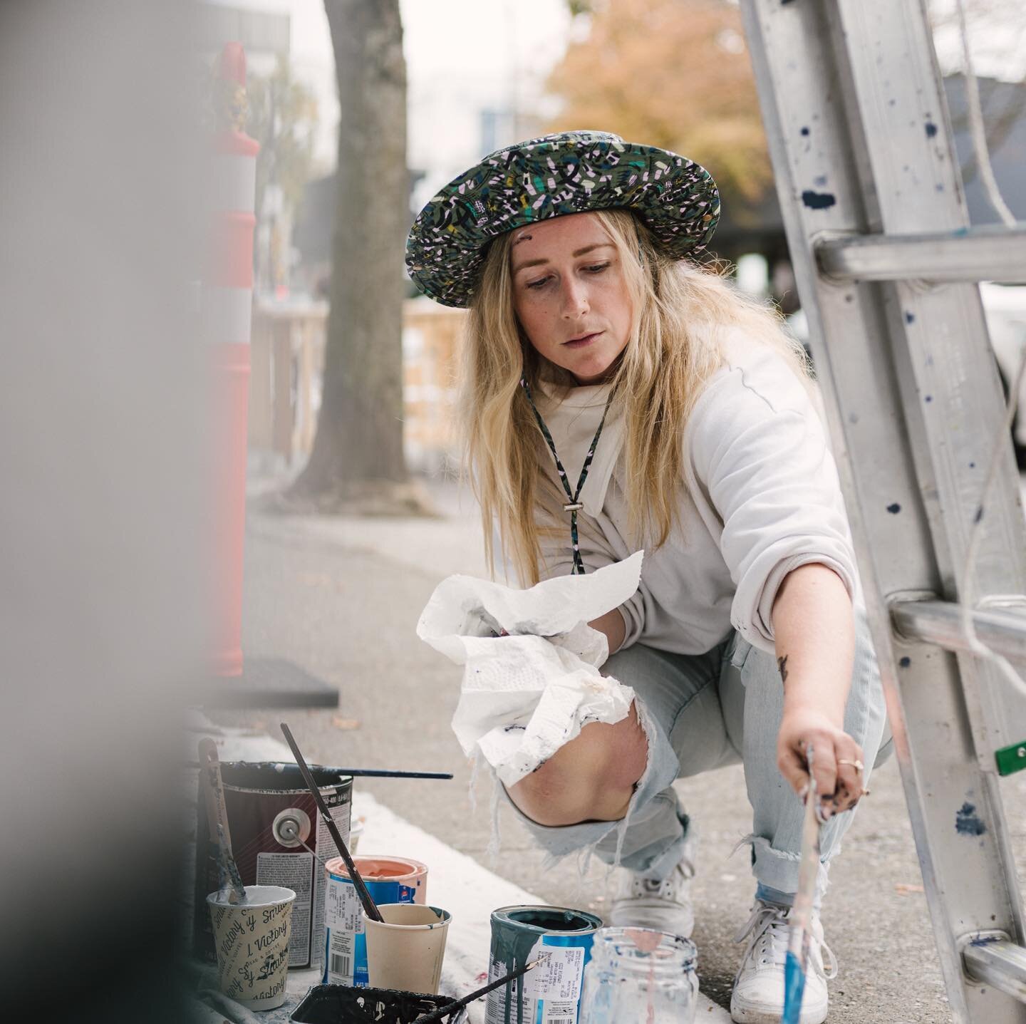 Caught in the zone. Paint on forehead, brush in hand✨Thanks @kezianphotography for capturing my progress @breakfasttable604 and my mural for @vanmuralfest🎨❤️ #vancouvermuralfestival #vancouvermurals