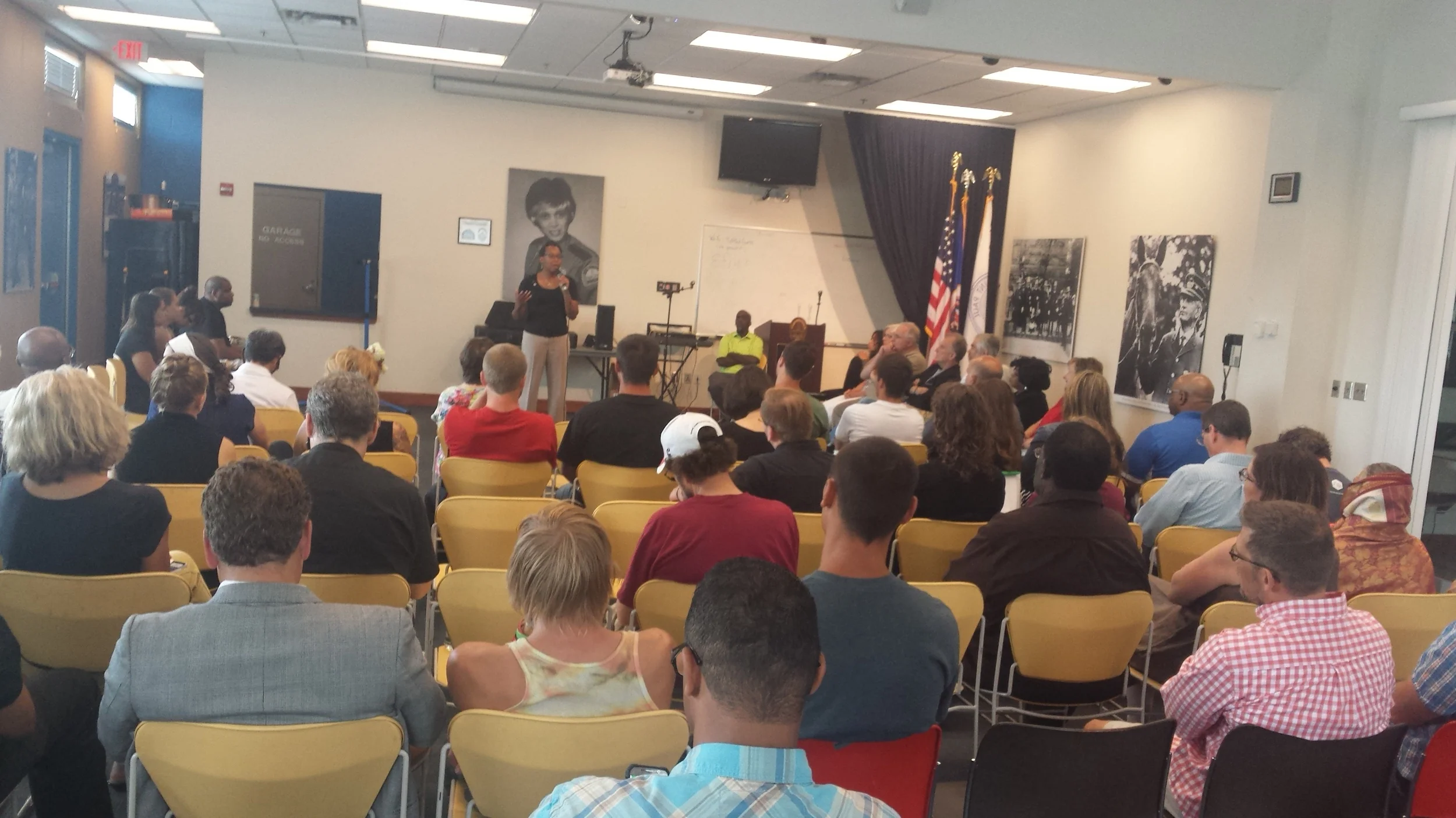 Church leaders gather to pray at a Saint Paul police station.