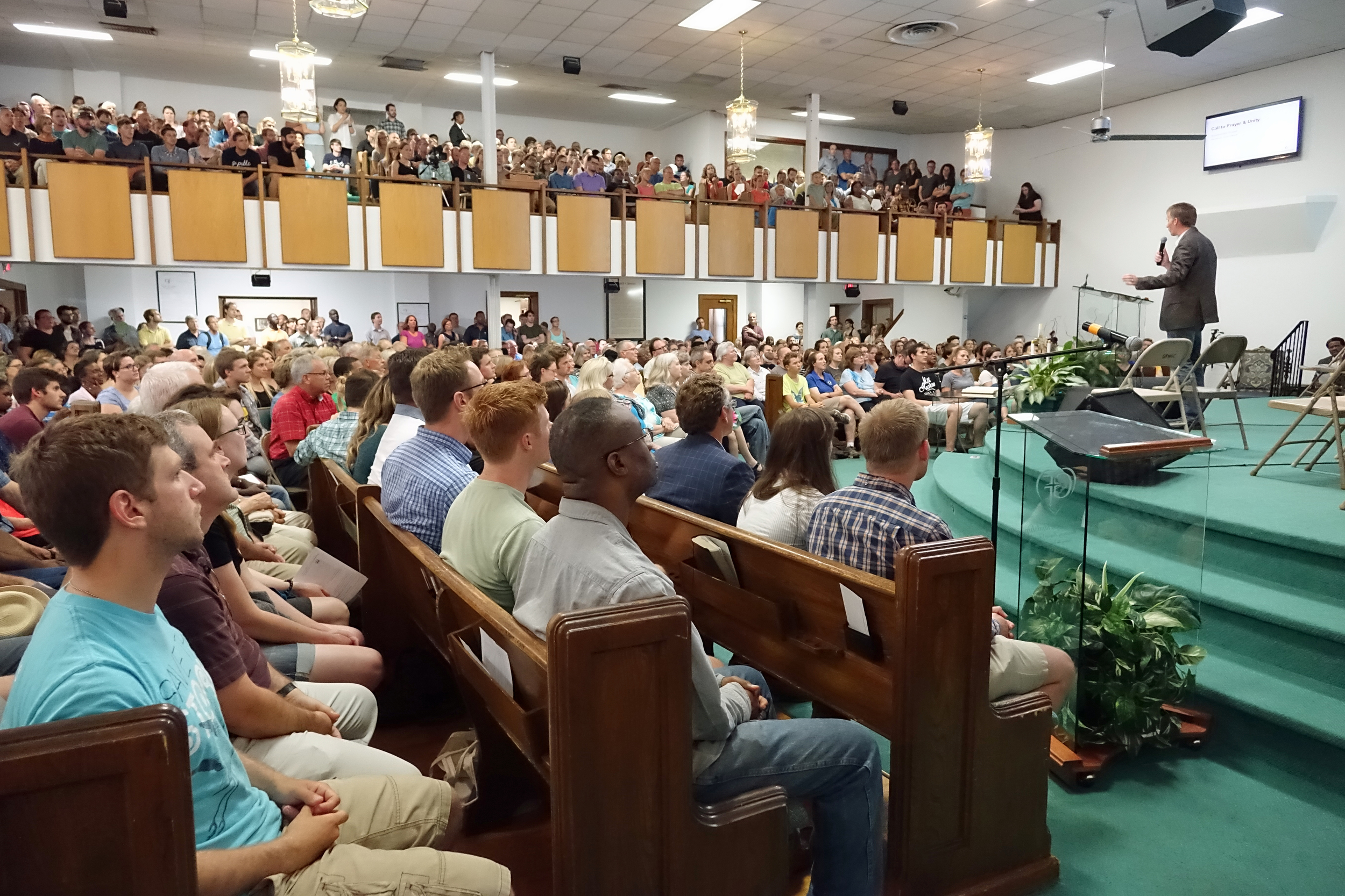 Pastor Jason Meyer address the crowd. Photo Credit: Transform MN. 