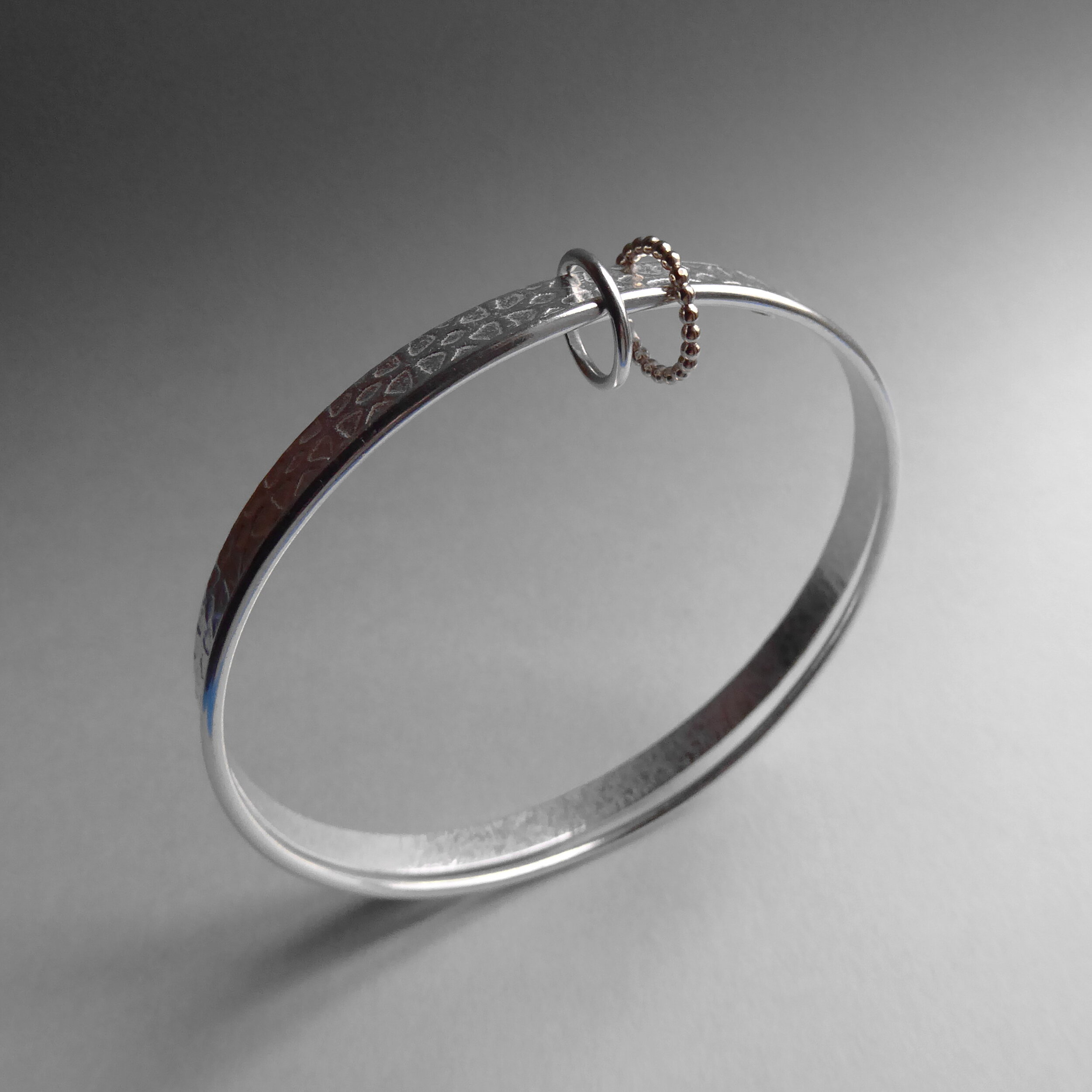 Double bangle with moving rings.jpg