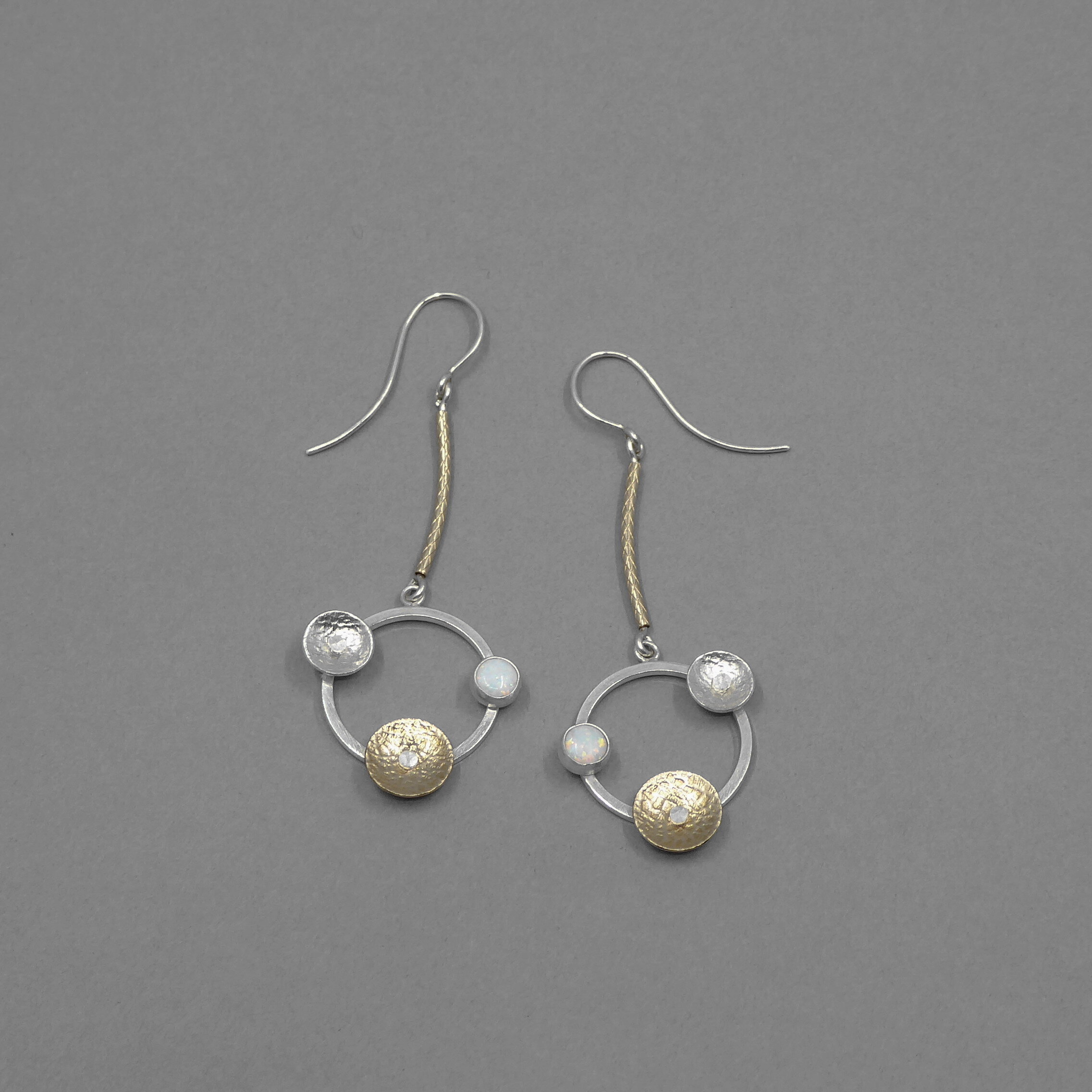 Earrings with silver and 14ct gold filled cup forms and opal.jpg