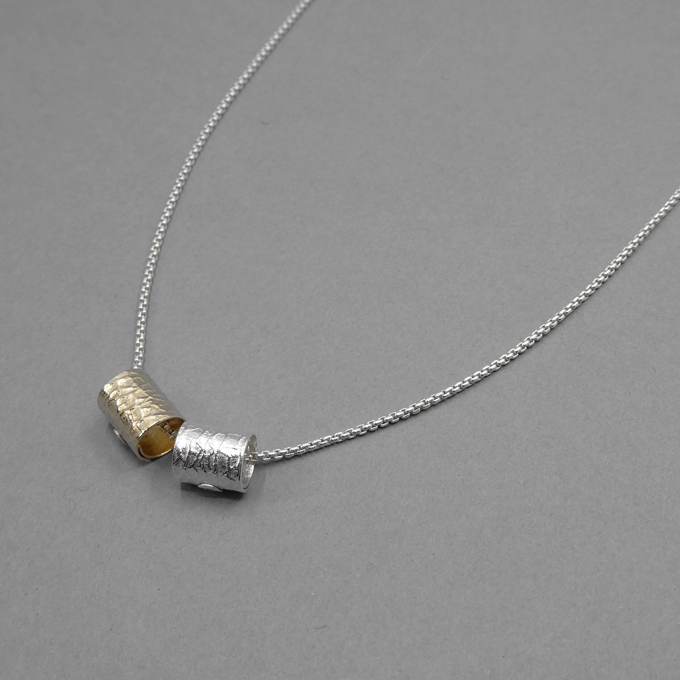 Silver and 14ct gold filled two scroll pendant.jpg