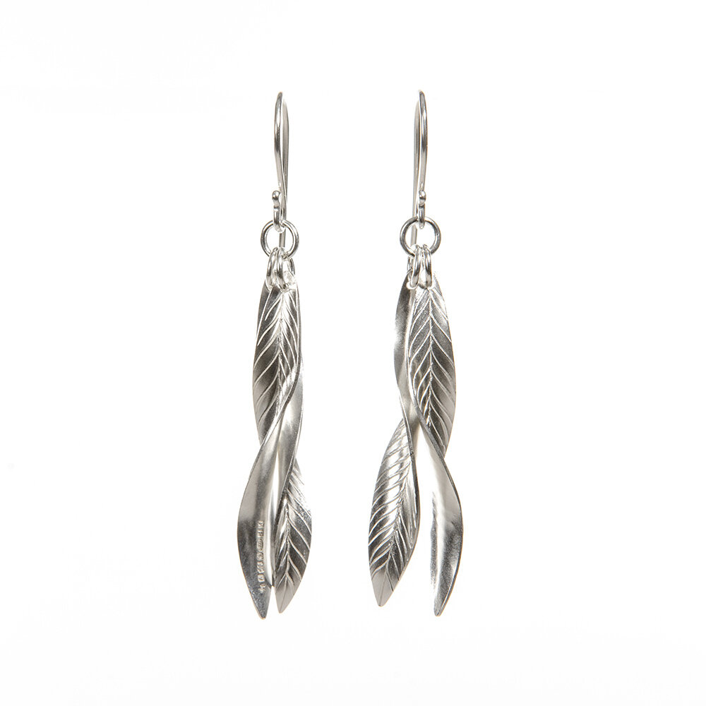 frond double leaf earrings on white.jpg