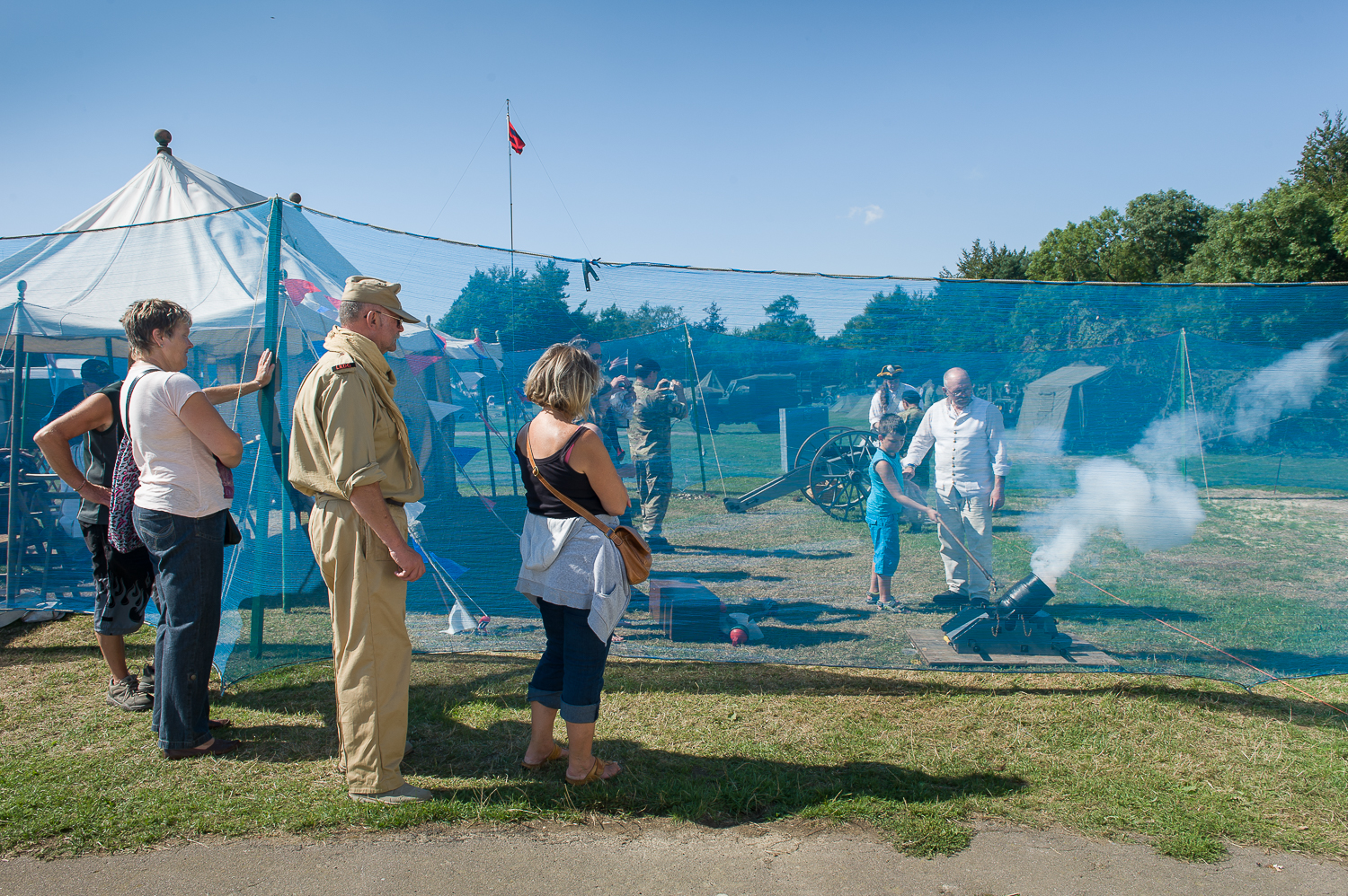  Visitor at a multi period event firing a small cannon. 