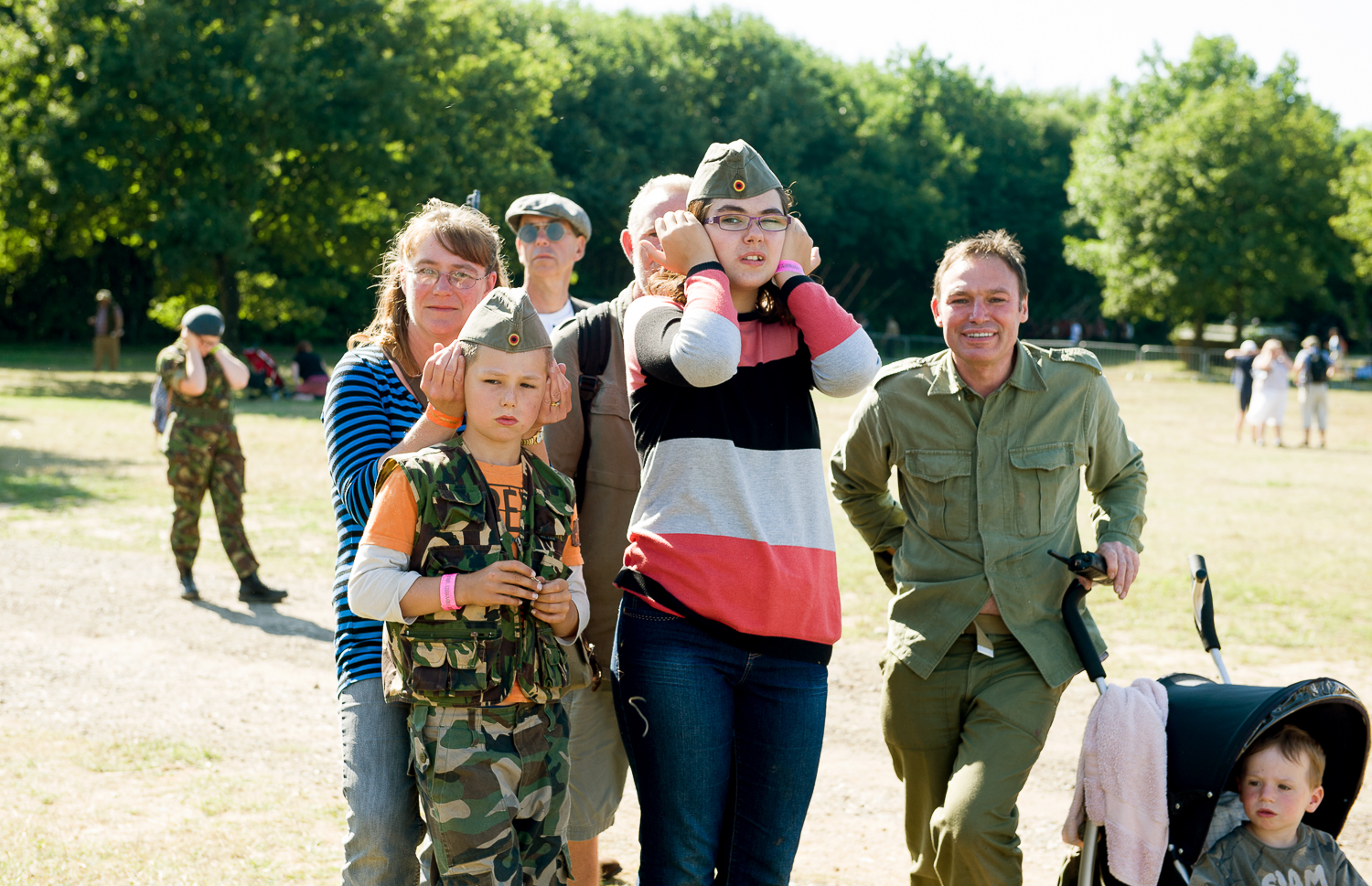  Visitors watching re-enactment of American Civil war Battle, involving firing of cannons, Multi period re-enactment event, Essex 