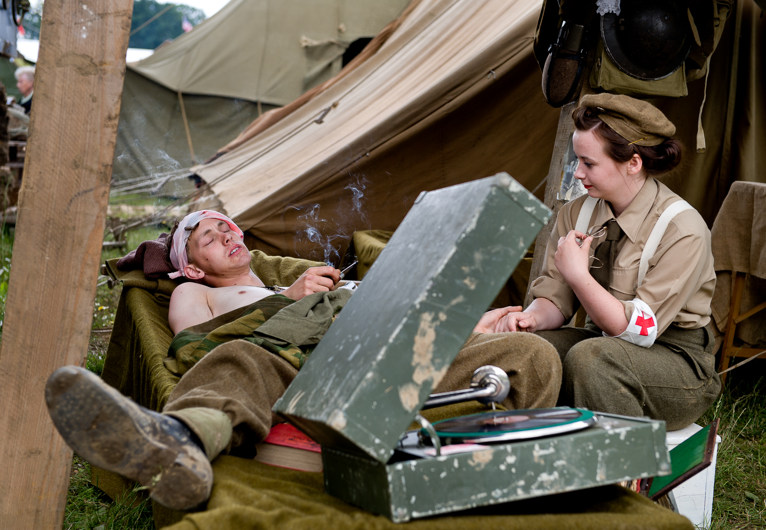  Nurse comforting injured soldier [re-enactors], War and Peace show, Kent 