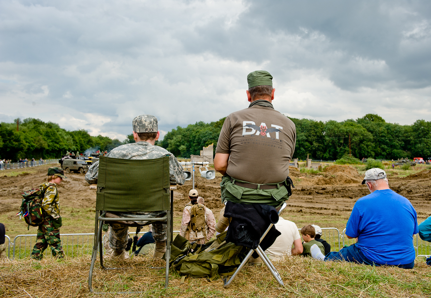  Father and son watching re-enactment of battle, War and Peace show, Kent 