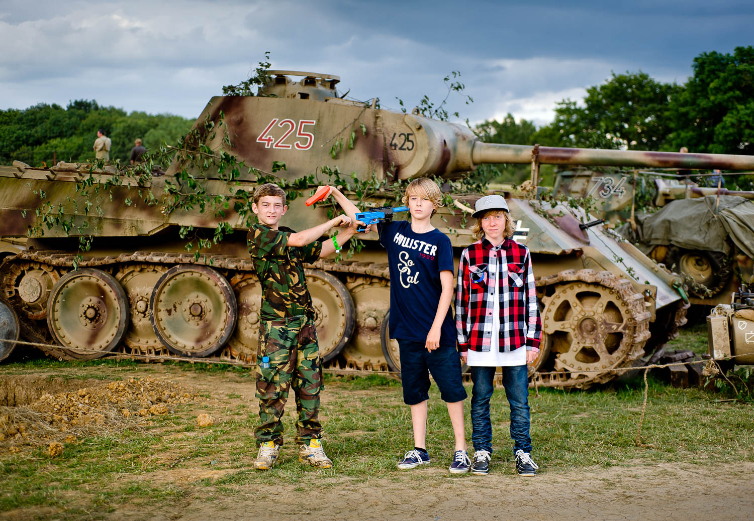  Boys posing near German WW2 tank, War and Peace show, Kent 