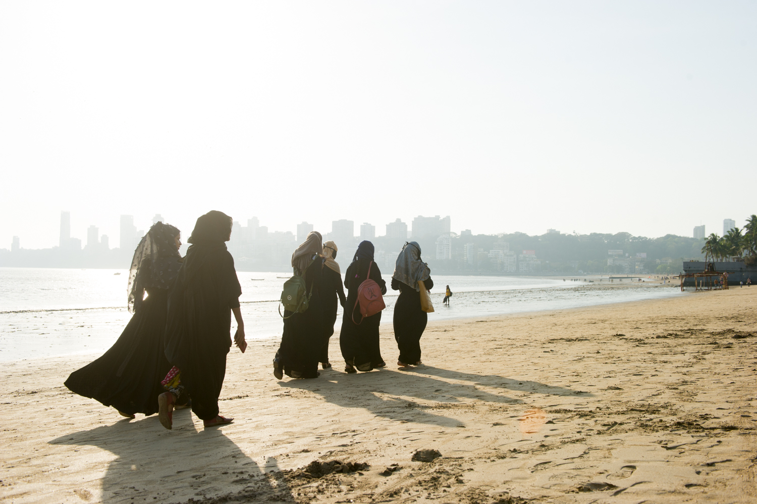  Muslim women taking a walk on the beach, Mumbai, 2019 