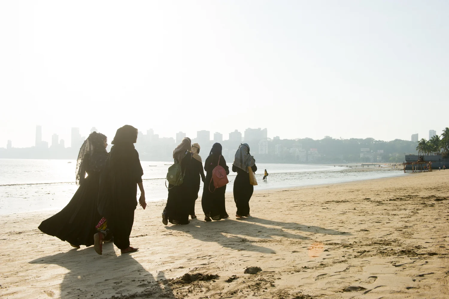 Muslim women taking a walk on the beach, Mumbai, 2019