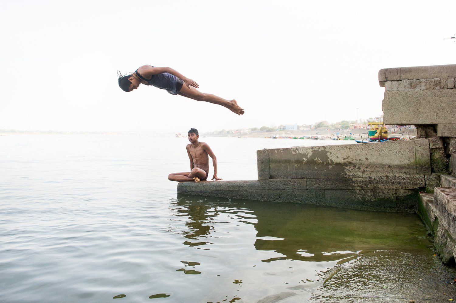  Bather jumping into the Ganges river, Varanasi, 2019 
