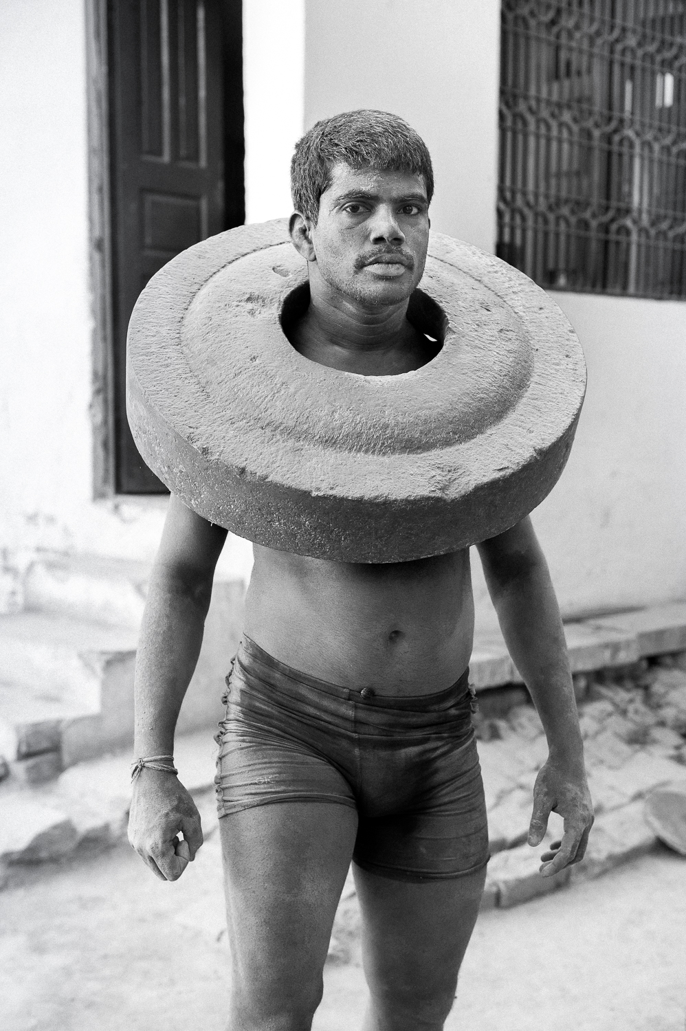  Kushti Wrestler exercising with concrete slab, Varanasi, 2019 