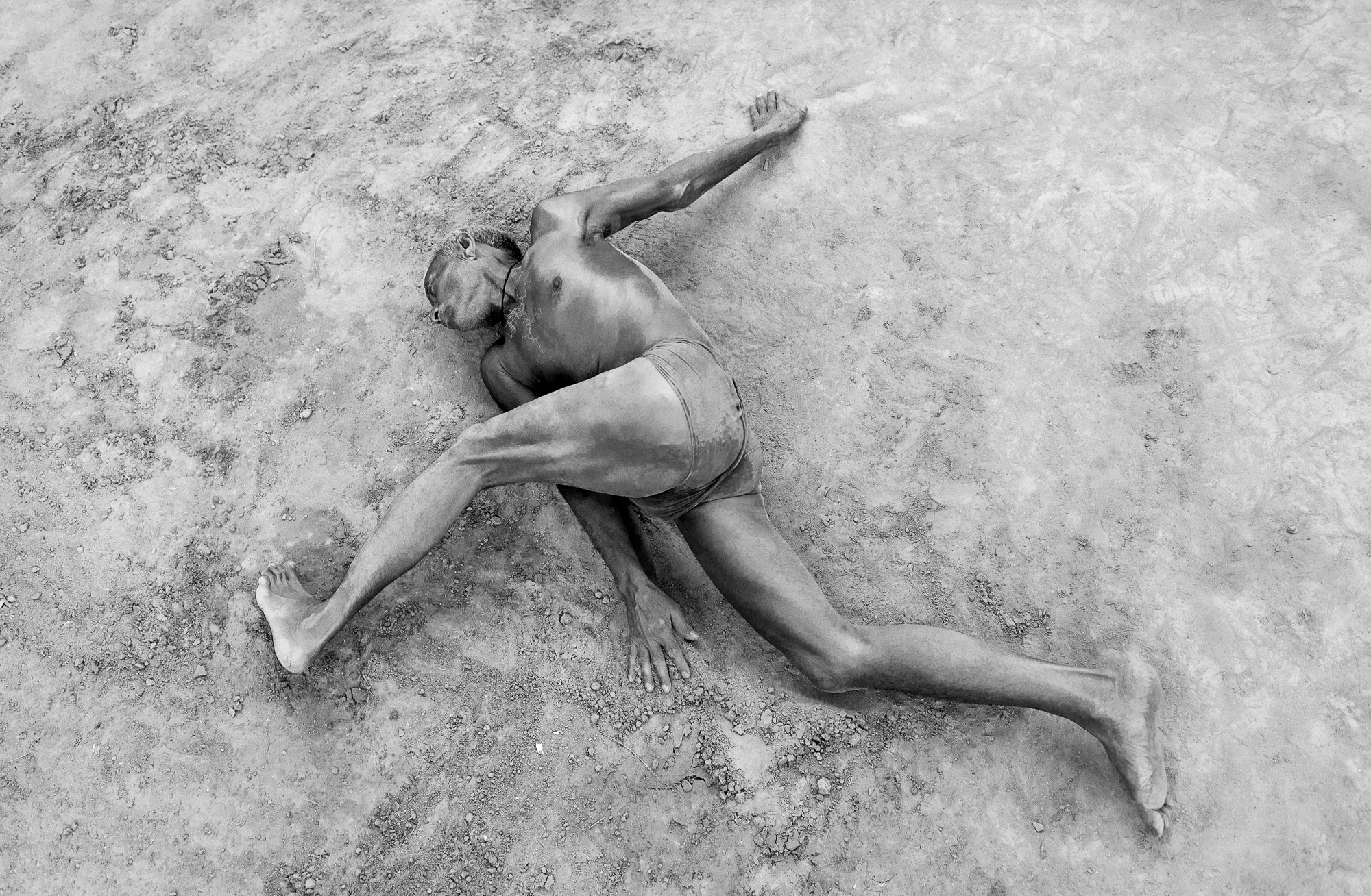 Wrestler stretching, Kushti Akhara, Varanasi, 2019