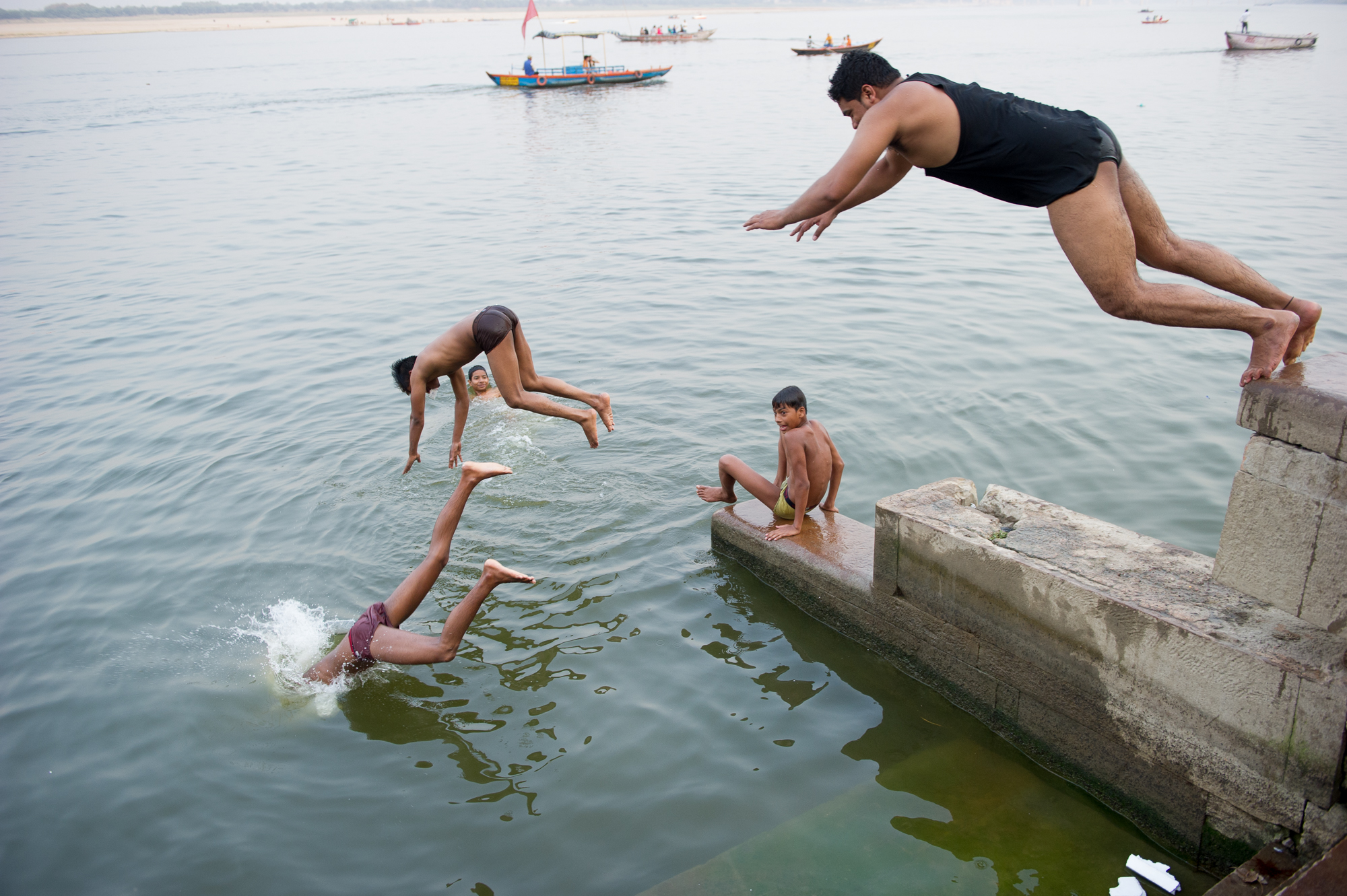  Bathers jumping into the Ganges, Varanasi, 2019 