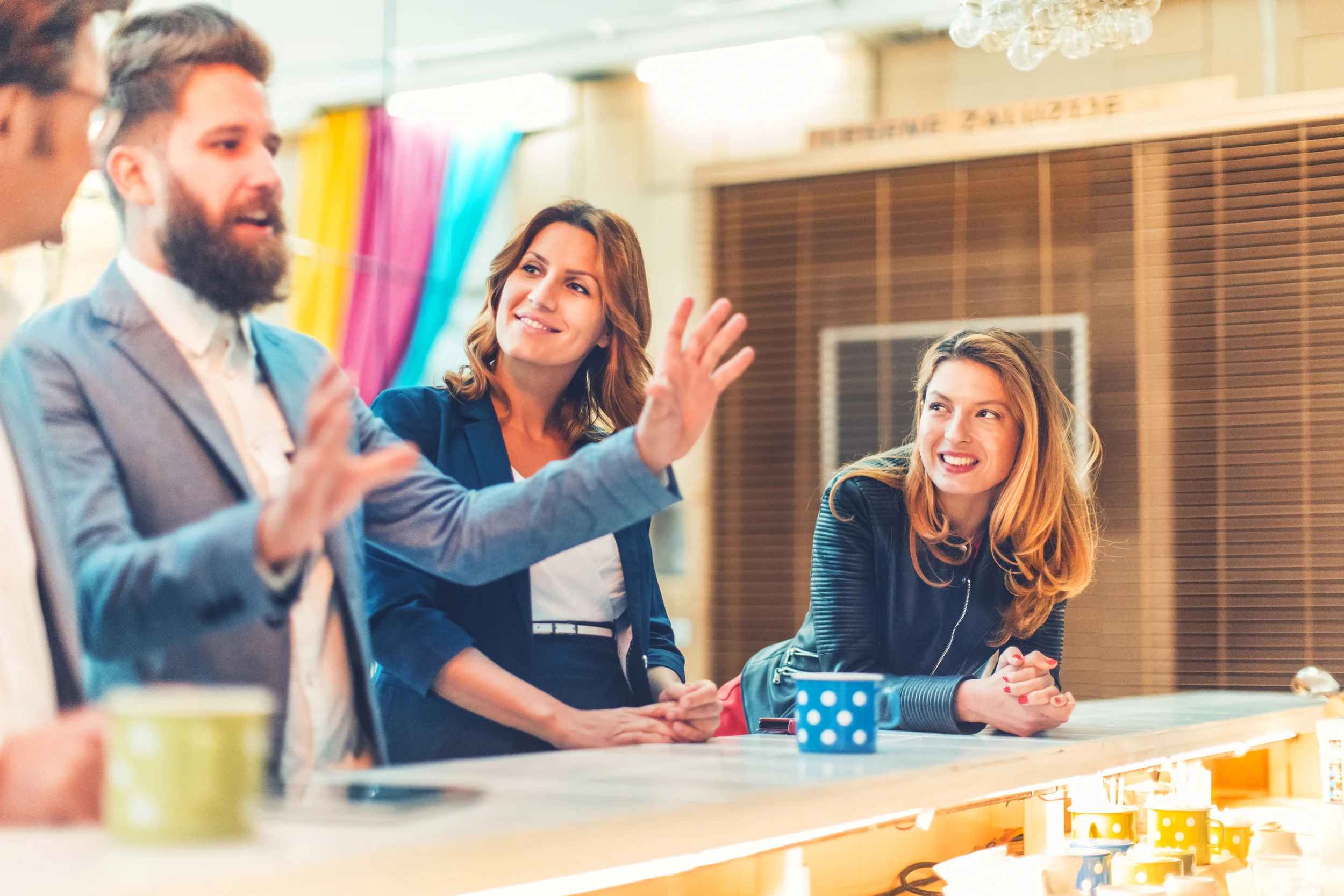 Office-workers-on-a-coffee-break,-fun,-passionate-000093761397_Large.jpg