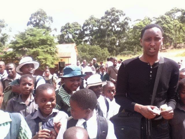 Abdul Adan with children from St Werburgh school