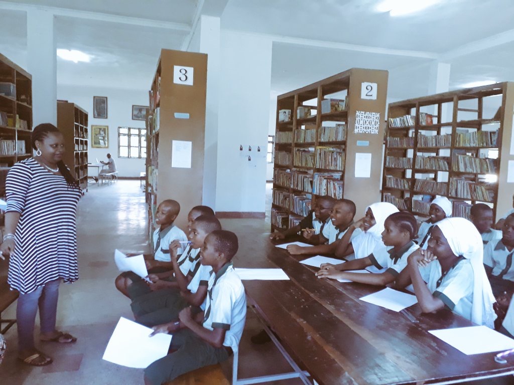 2017 Caine Prize workshop writer, Esther Karin Mngodo, with students from Nianjema High School