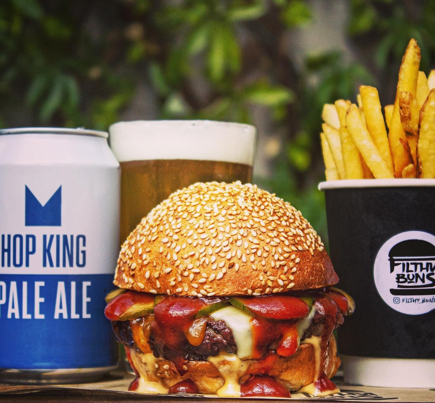 🚨Burger + Fries + Beer only &pound;12.50 every Mon-Weds in September 😲@filthy_buns &amp; @hop_king present the &quot;Filthy Bun...dle!&quot; Offer includes all #burgers under &pound;10 including our #vegan menu too. Get in! 📸: @mobolobo