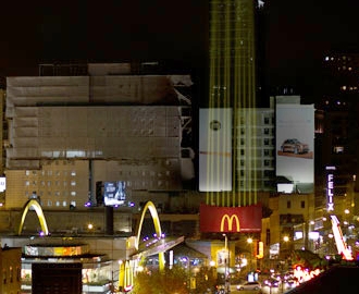 Pick Your Spot - This over the top wallscape, featuring french fried light beams shooting into the night sky, was strategically placed across from the flagship Rock & Roll McDonald's in River North (source: adweek.com).