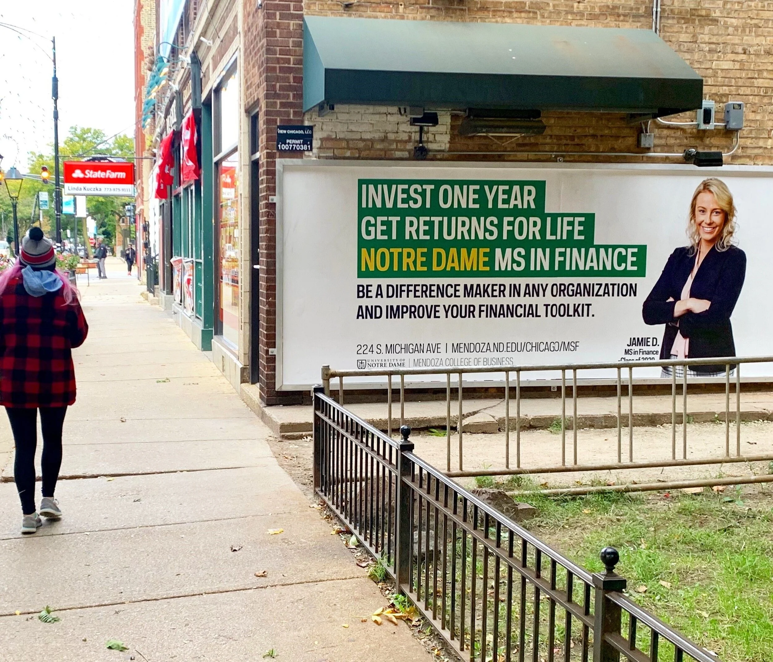 Higher education wild posting ad for American Women’s College reaching pedestrians in a walkable neighborhood