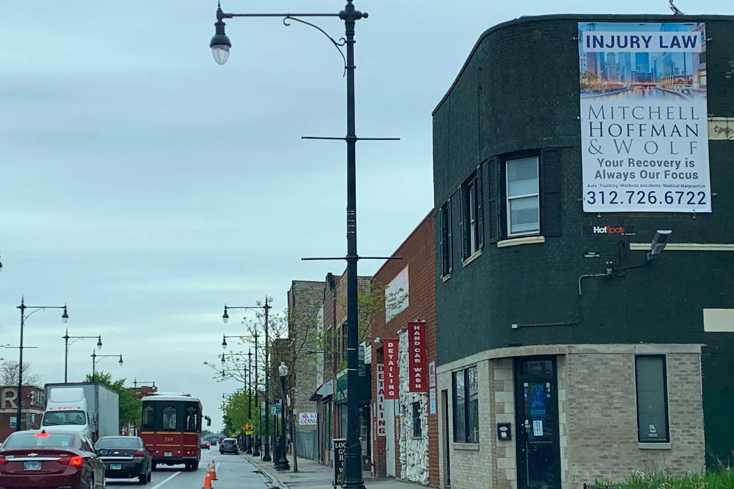 Attorney outdoor advertising campaign promoting Mitchell Hoffman & Wolf law services to local drivers