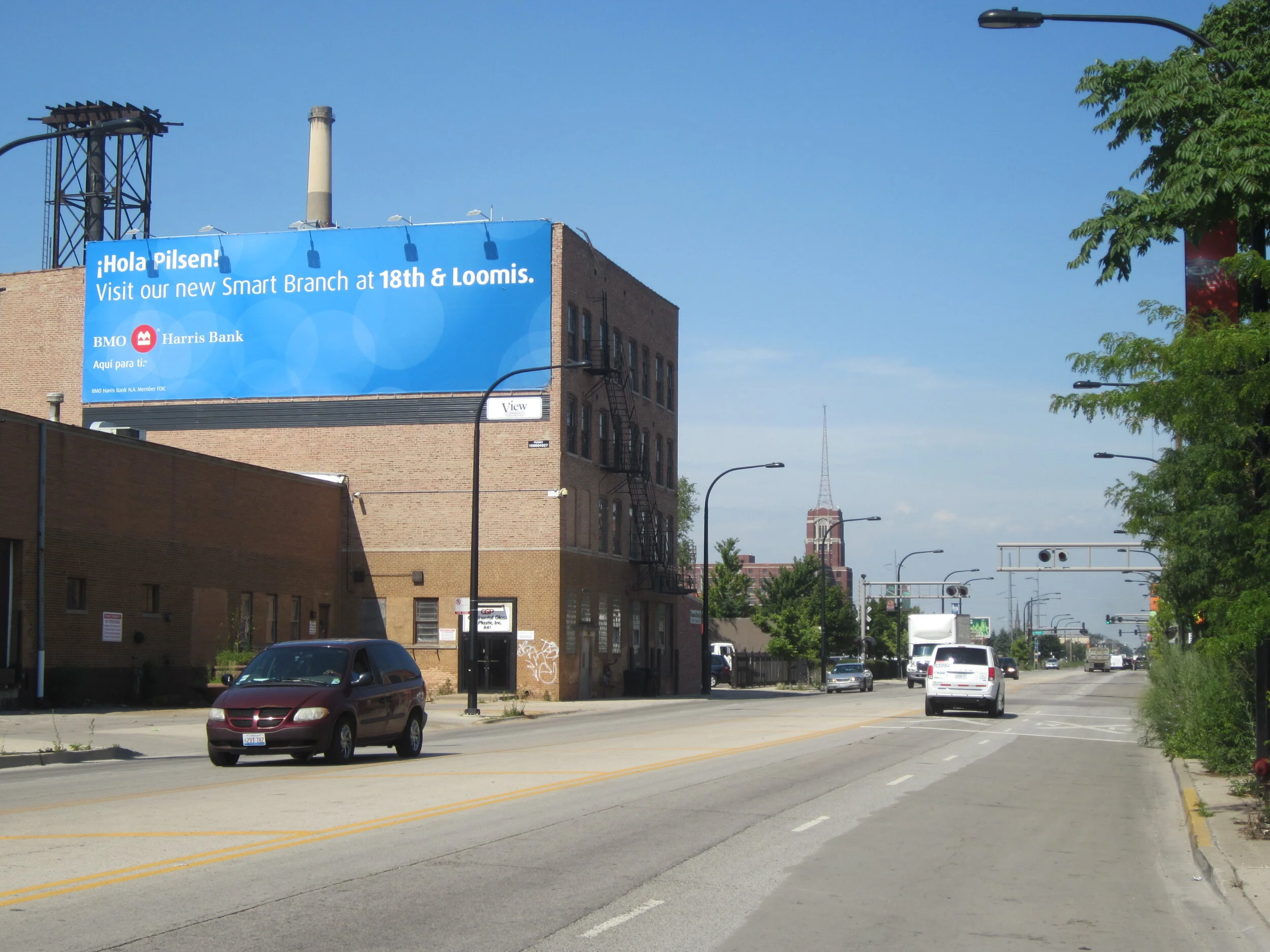 Small business billboard advertising campaign reaching local drivers with high-visibility neighborhood placement