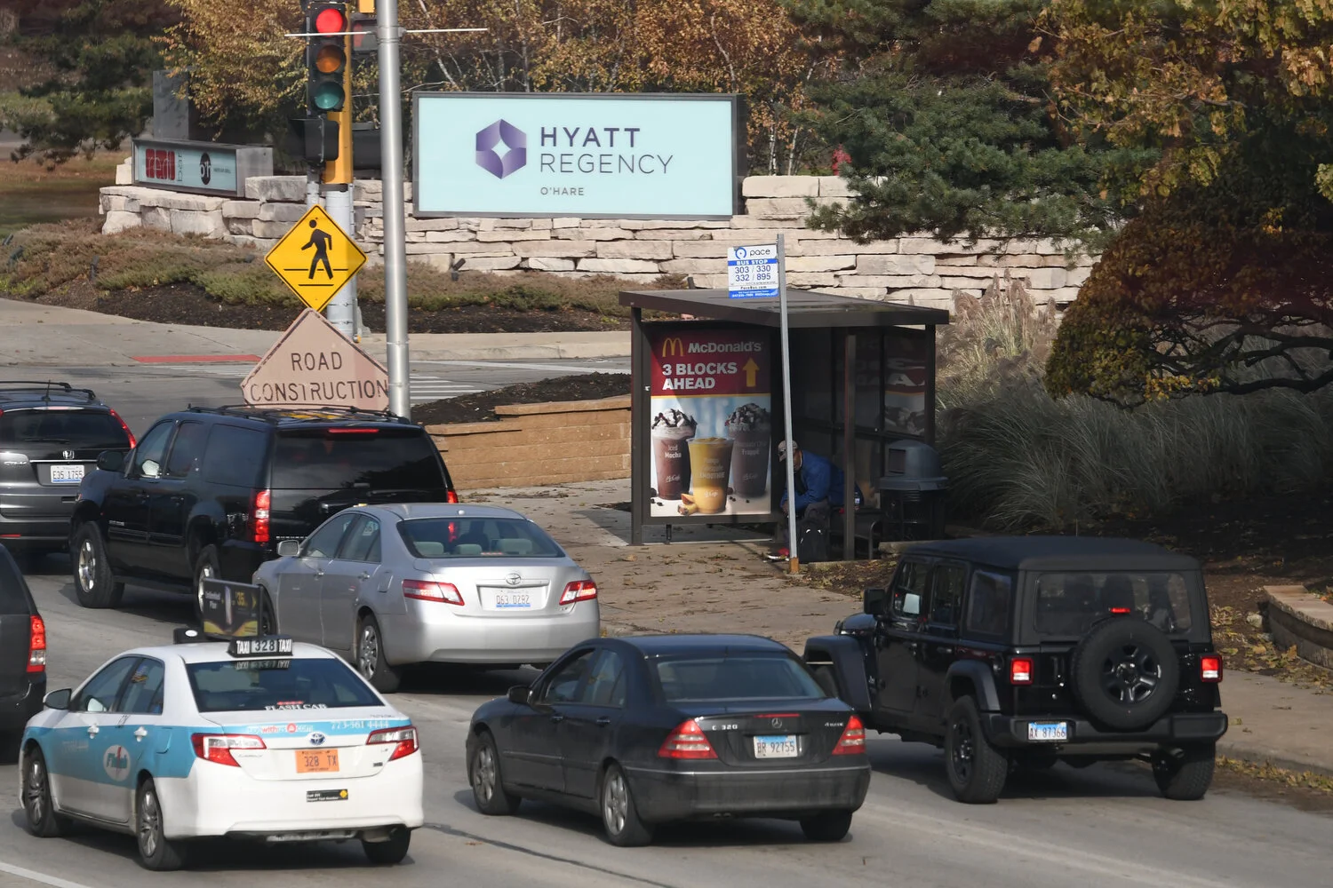 Bus shelter street furniture advertising near Hyatt Regency O’Hare and Stephens Convention Center in Rosemont