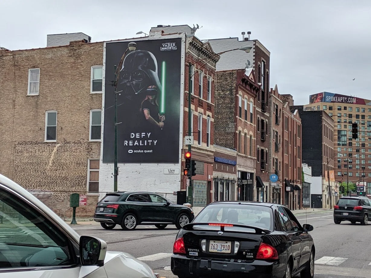 Transit shelter street furniture ad for retail advertising reaching pedestrians, drivers, and bus riders