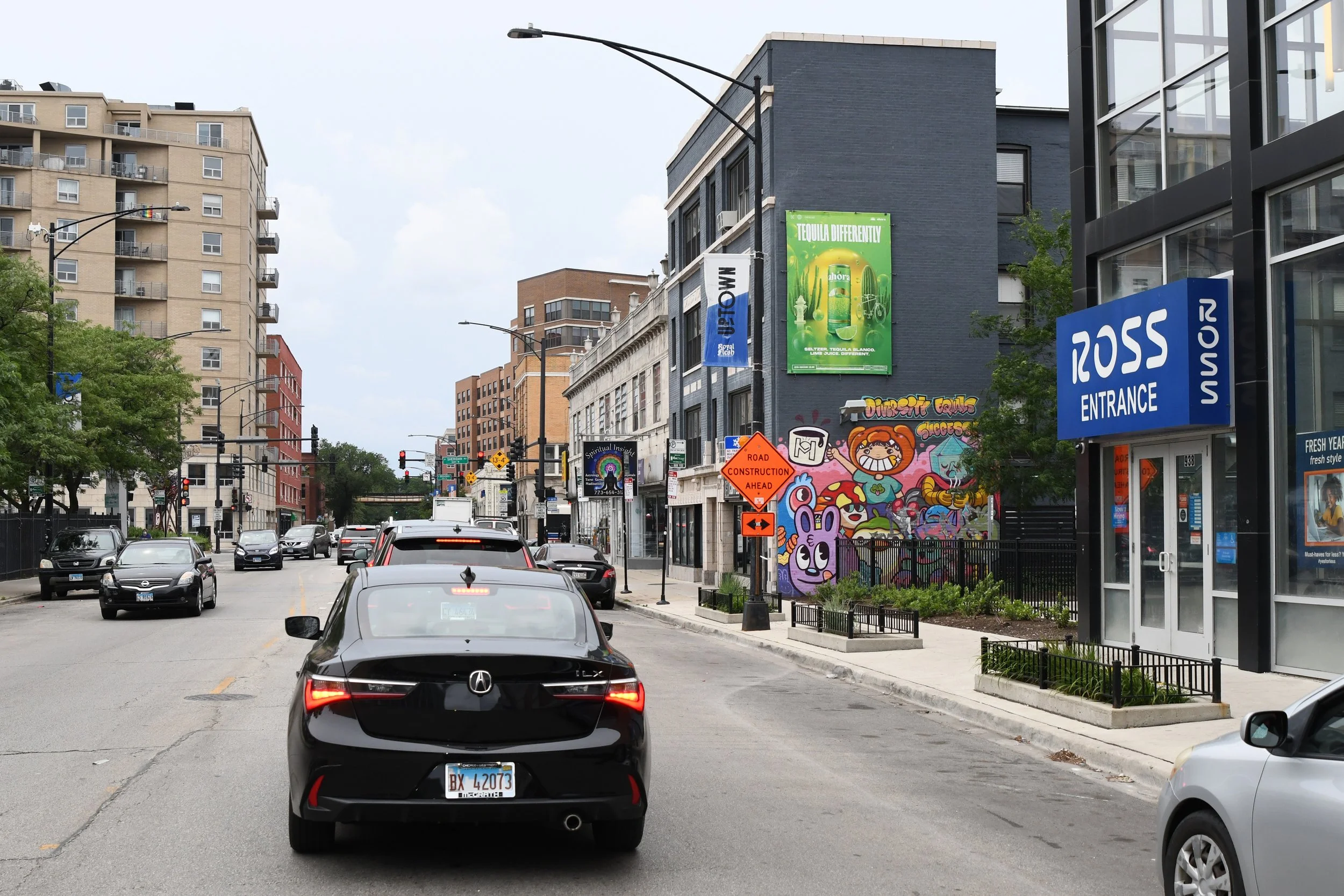 Food and beverage outdoor advertising campaign for Chicago on a Plate displayed in a high-traffic dining district