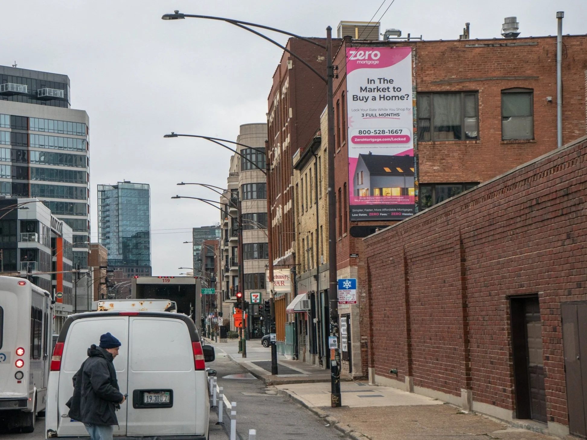 Real estate outdoor advertising campaign displayed along a busy Chicago street to build neighborhood brand awareness