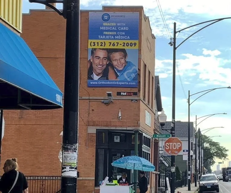 Orthodontic Experts HotSpot ad promoting braces and medical card payment options to local patients