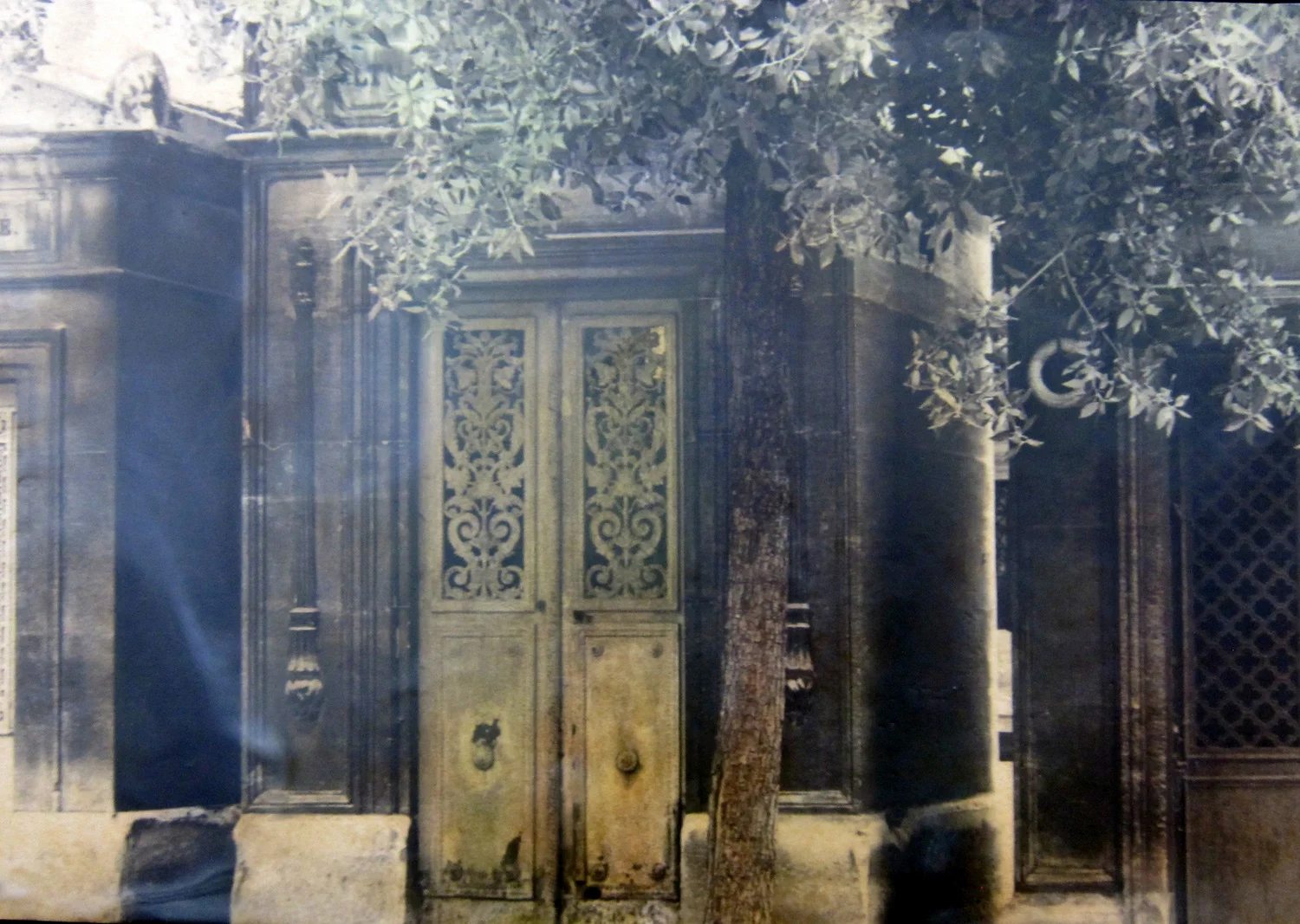   Pere Lachaise I   Pere Lachaise, Paris  Silver gelatin print. Hand-tinted encaustic. Limited numbered edition.&nbsp;9" x 13" 