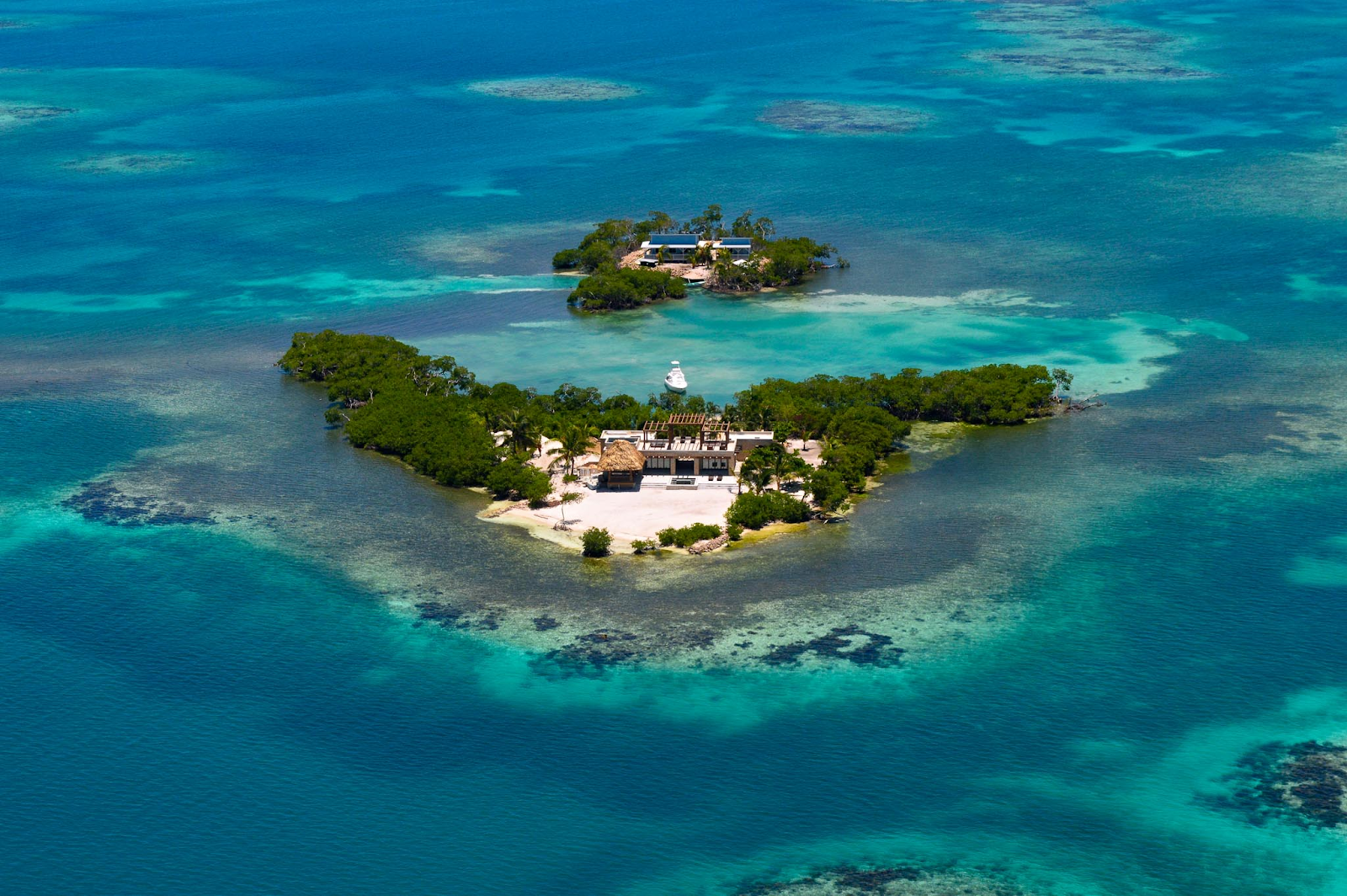 An aerial photo of the two islands at Gladden Private Island
