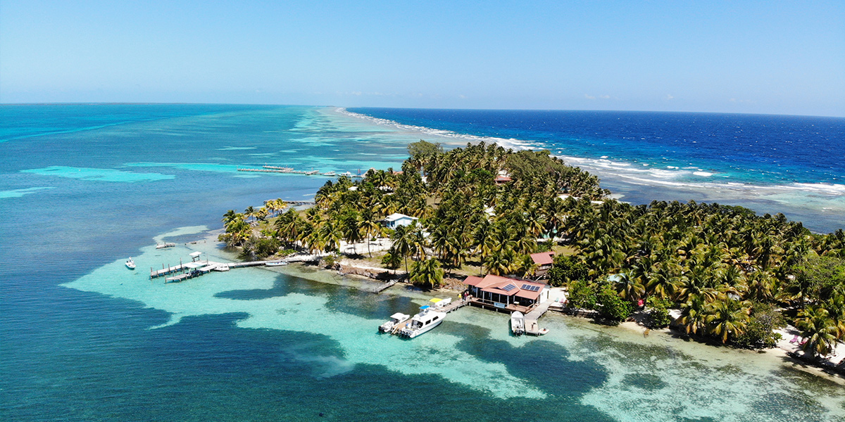 An aeriel photograph of docked boats at South Water Caye Marine Reserve