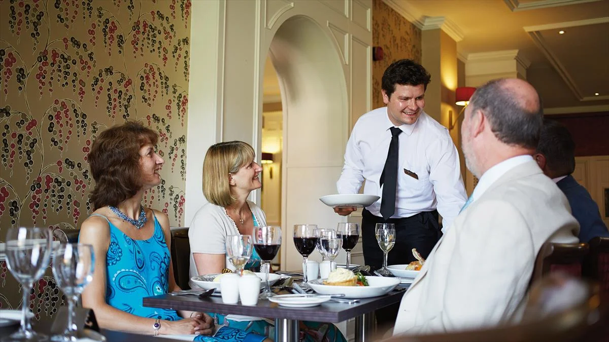 Service in The Rawson restaurant at Nidd Hall Hotel