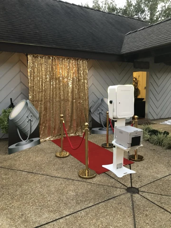 Gold sequin backdrop with a Rock-It open air photo booth